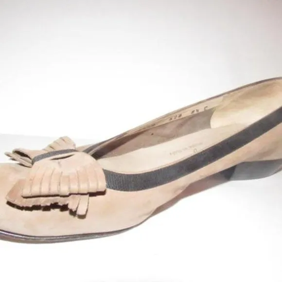 Salvatore Ferragamo VARA brown suede flats with black trim, large, fringe bows at the toes, and low, wedge heels